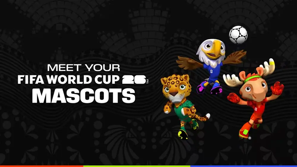 Les trois mascottes de la Coupe du Monde 2026 avec un ballon de foot